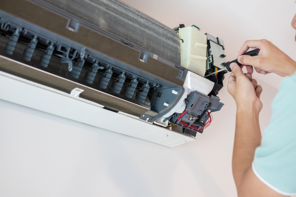 Air conditioning system being serviced in Reigate by CrispAC certified engineer