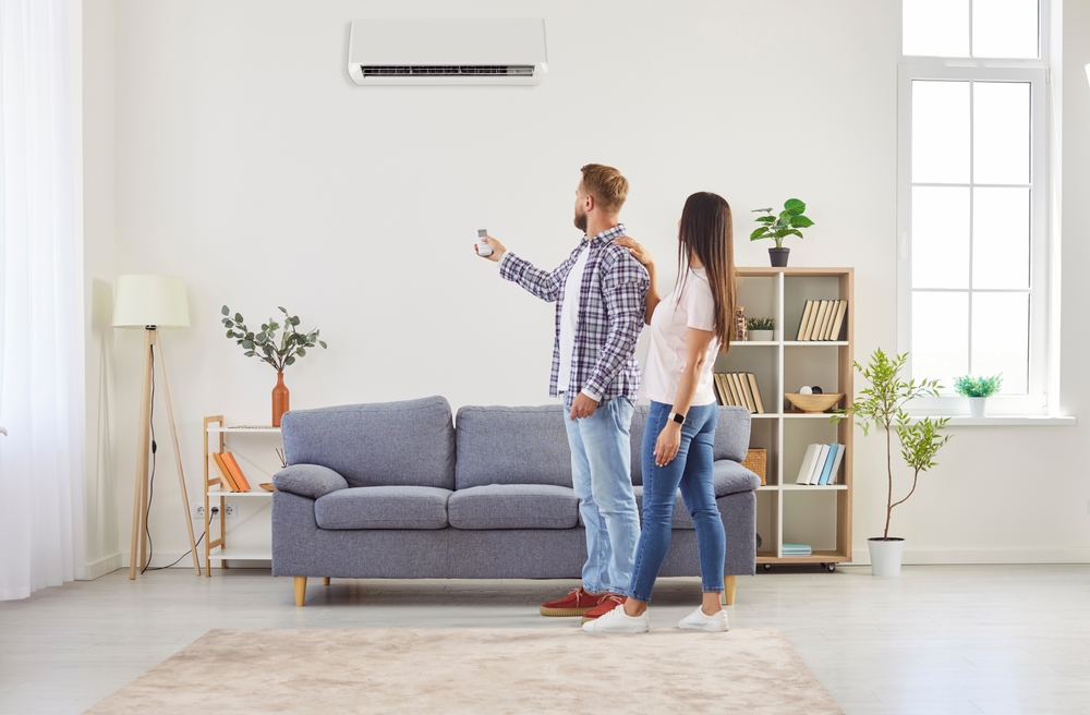 Couple enjoying their newly installed air conditioning in Reigate by CrispAC